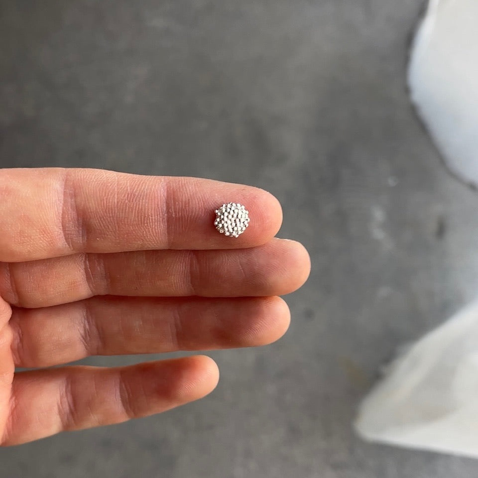 flat pom flower